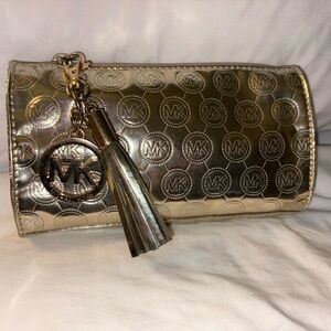 Michael Kors Gold Metallic MK Embossed Tassel Makeup Bag